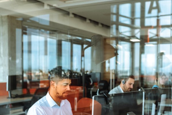 Man typing on laptop